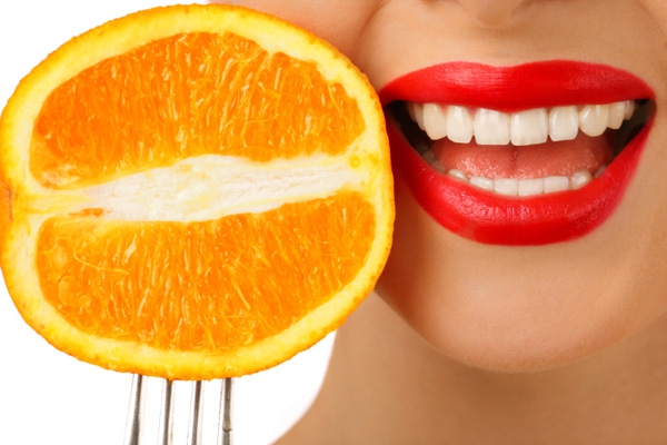 Acid orange teeth tooth erosion enamel wear dissolution dentist Claremont